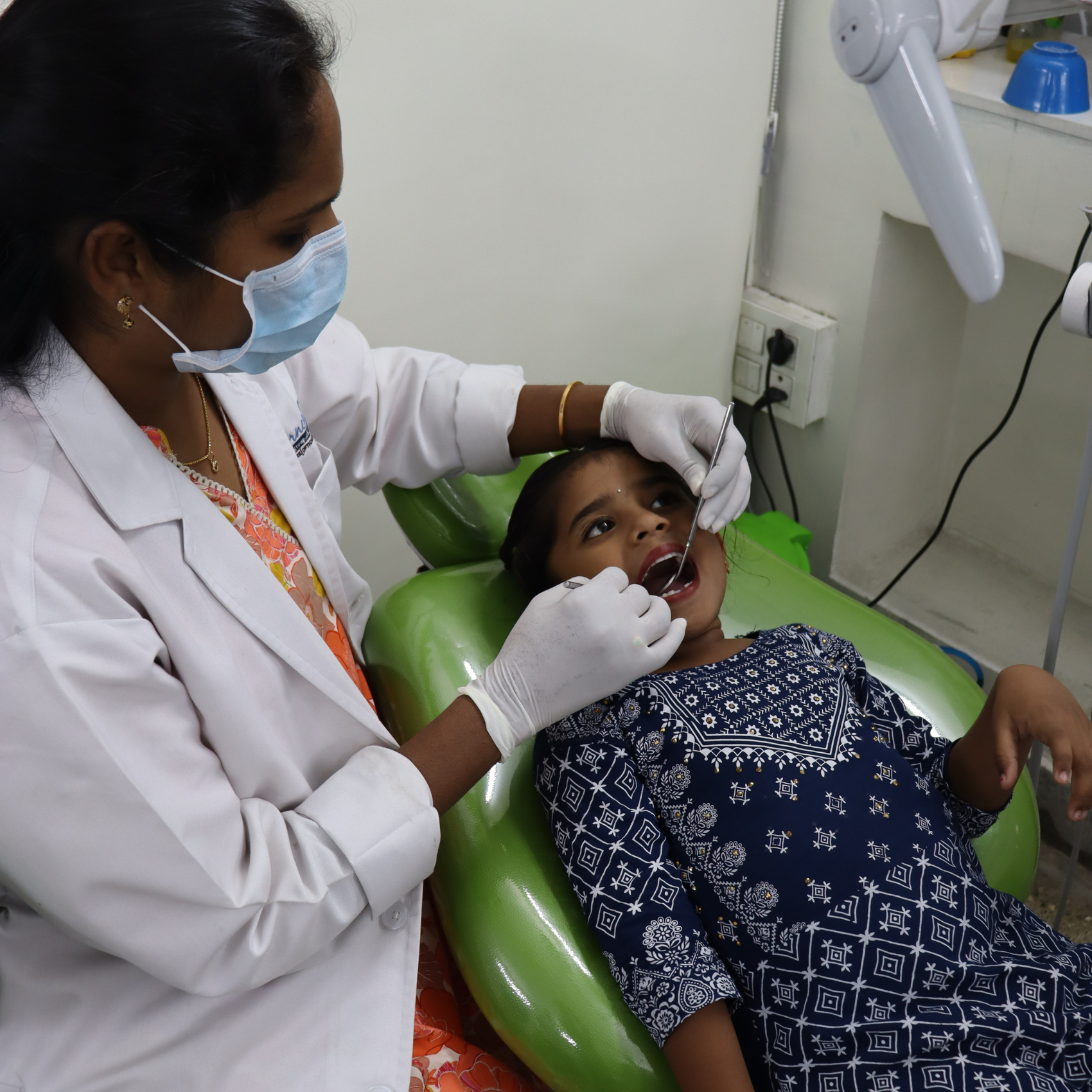 dentist of corneal dent treating a patient 2